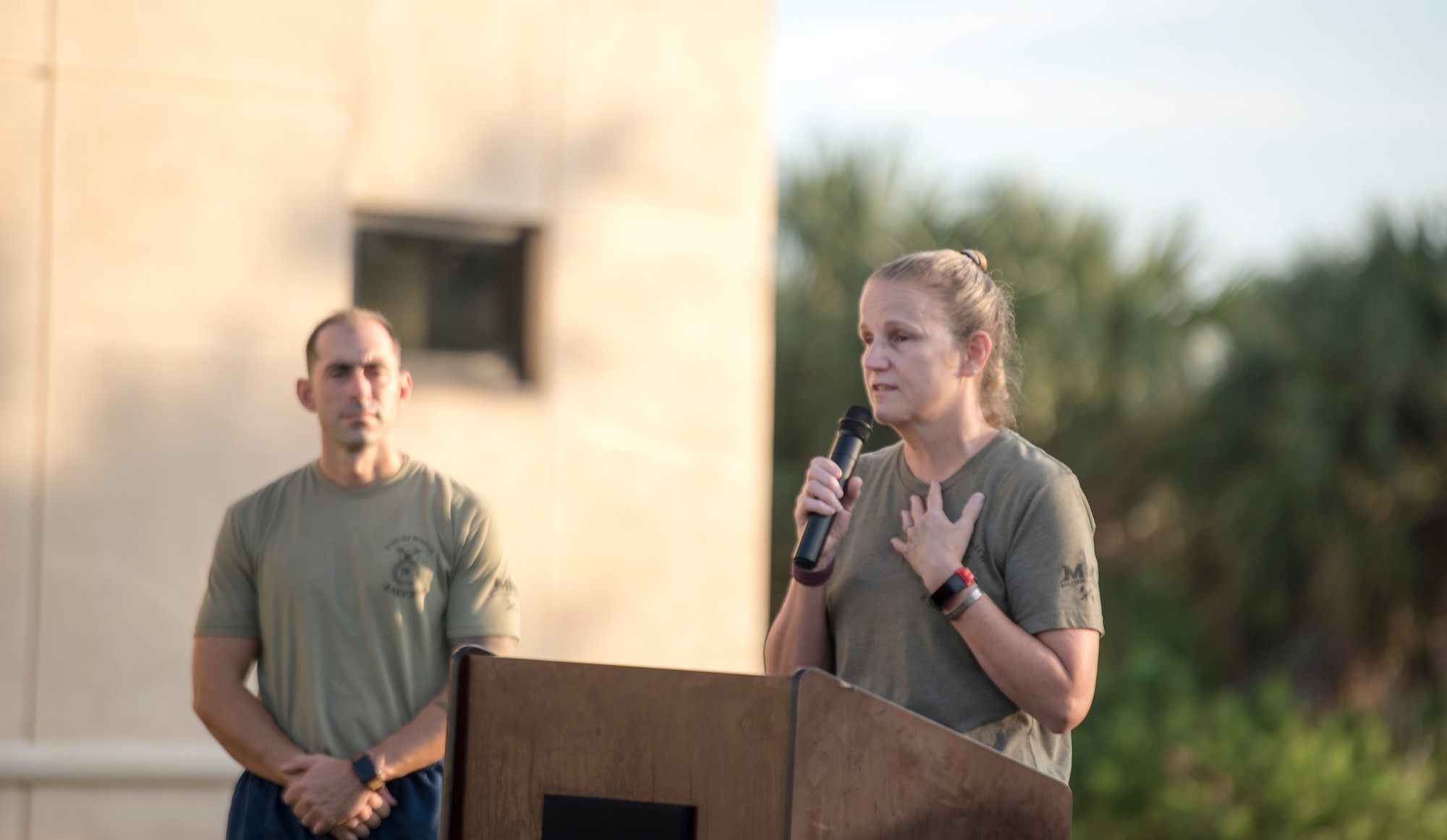 Jiffy Helton, the mother of 1st Lt. Joseph Helton, addresses the 6th Security Forces Squadron before the 11th annual Helton Haul 5K run, at MacDill Air Force Base, Fla., Sept. 18, 2020.