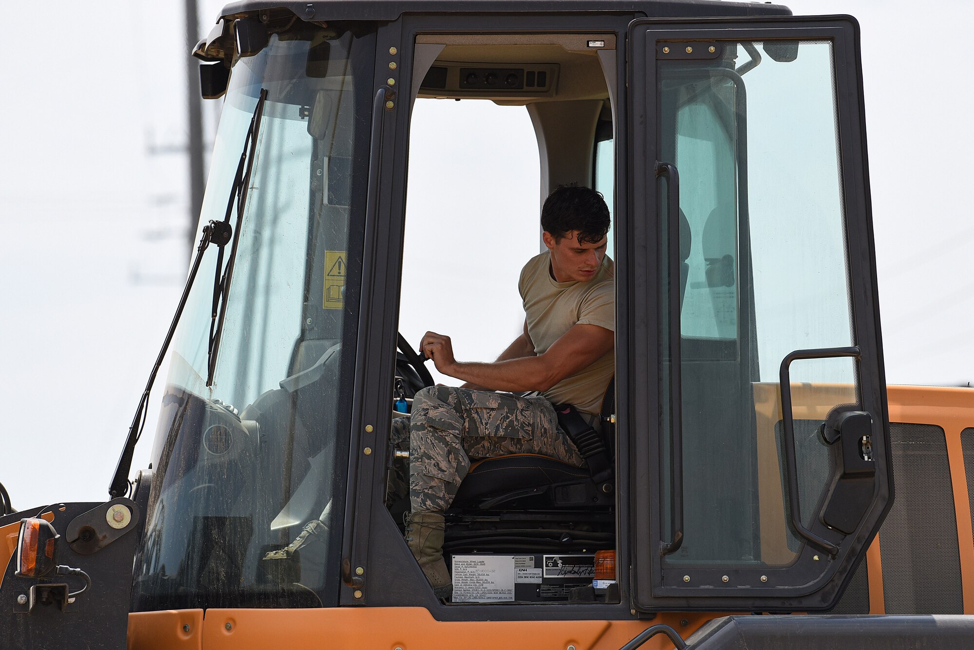 Airman 1st Class Brian Farris, 30th Civil Engineer Squadron heavy equipment operator, works on the gaseous nitrogen pad Aug. 18, 2020, at Vandenberg Air Force Base, Calif. The pad will be used to bed-down trucks and trailers outfitted with nitrogen production equipment to supply gaseous nitrogen for upcoming ULA Delta Heavy launches. (U.S. Air Force photo by Senior Airman Hanah Abercrombie)