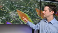 NRL's Adam Moses with CT-Analyst, developed by researchers at NRL in the Laboratories for Computational Physics and Fluid Dynamics. CT-Analyst is a tool designed to provide first responders with fast and accurate predictions of chemical, biological, and radiological agent transport in urban environments.
