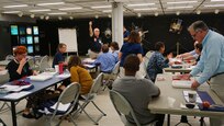 Professor Patrick Moran, from the U.S. Naval Academy STEM Center, speaks to attendees at NRL’s Best Practices in STEM Outreach workshop Oct. 18, 2016. A mixture of NRL scientists, engineers and staff, along with active duty members and local teacher liaison attended the day-long workshop, exploring different methods of making STEM topics a little more fun for students.