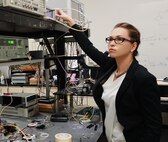 Dr. Meredith Hutchinson characterizes plate detectors while conducting basic research in the applied RF photonics lab at the U.S. Naval Research Laboratory recently. Hutchinson is president of NRL’s Women in Science and Engineering (WISE), an organization on the lab that provides a means of networking and mentoring for women here.