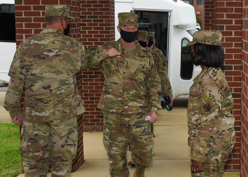 U.S. Air Force Gen. Mark Kelly, Commander of Air Combat Command, is greeted by Airmen.