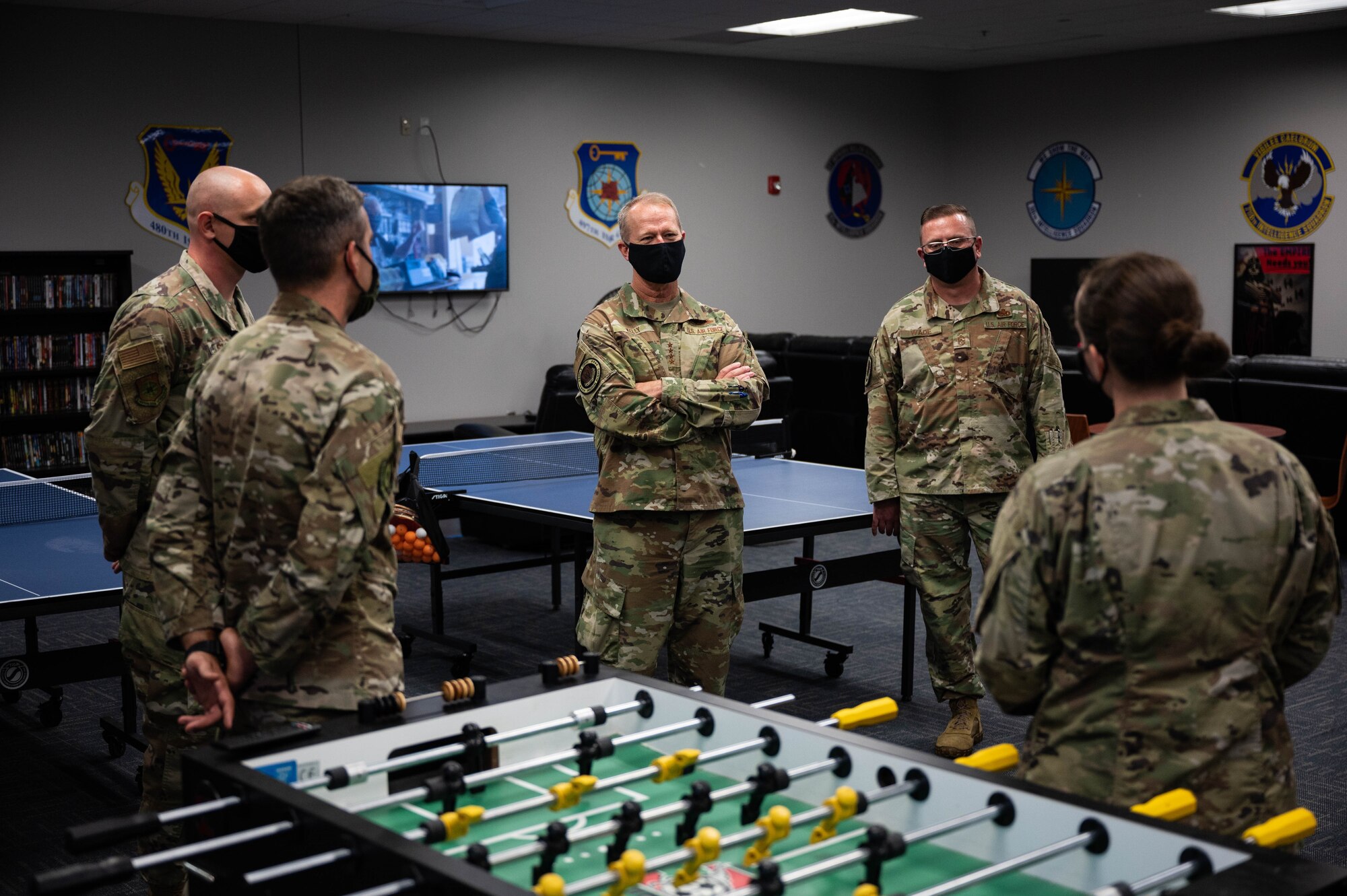 U.S. Air Force Gen. Mark Kelly, Commander of Air Combat Command, speaks with individuals from the 497th Intelligence, Surveillance and Reconnaissance Group.
