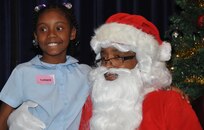 The Naval Research Laboratory celebrated 50 years of hosting neighboring students for a children’s holiday party Dec. 12. During the annual event, elementary-aged kids visit the lab to enjoy games, music, food and entertainment before receiving gifts.