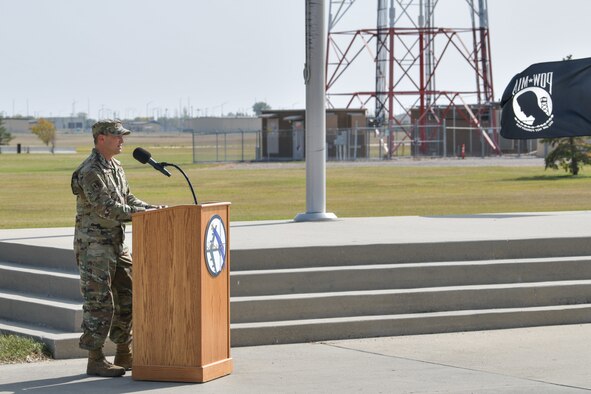 Colonel Brian Vlaun, 5th Bomb Wing vice commander, gives a speech Sep. 17, 2020, at Minot 
Air Force Base, North Dakota. Team Minot Airmen from the 5th Bomb Wing and 91st Missile Wing participated in the annual POW/MIA 24-hour Recognition run and retreat.(U.S. Air Force photo by Airman First Class Jan K. Valle)