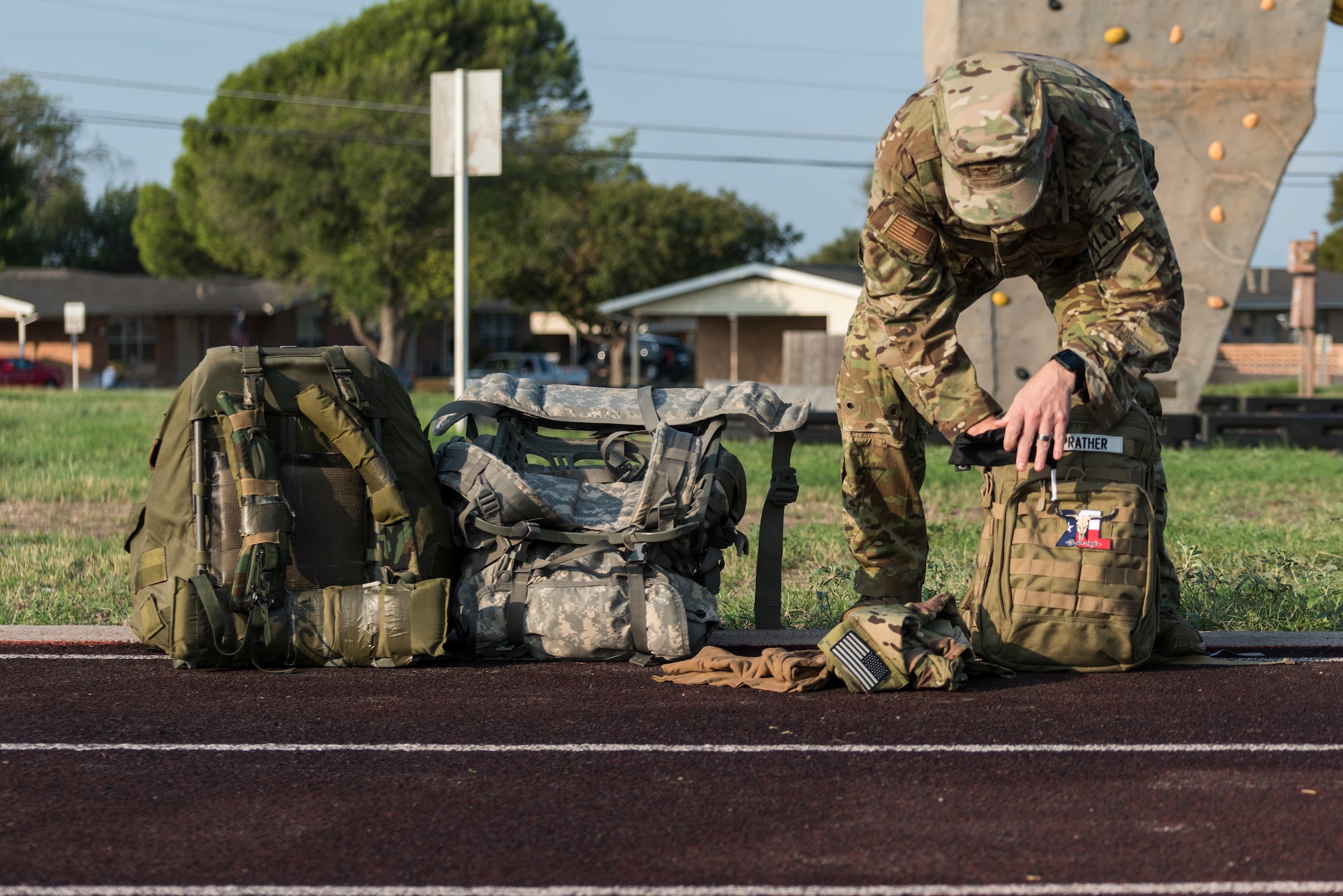Col. Craig Prather, 47th Flying Training Wing commander, prepares his gear for the ruck competition around the base perimeter in celebration of the Air Force’s 73rd birthday on Sept. 18, 2020, at Laughlin Air Force Base, Texas. “Today is more than just the United States Air Force’s 73rd birthday,” said Chief Master JoAnne S. Bass, Chief Master Sergeant of the Air Force, in a shared Facebook post. “Today is an opportunity to reflect on where we came from, how we got here and where we are going.” (U.S. Air Force photo by Senior Airman Anne McCready)