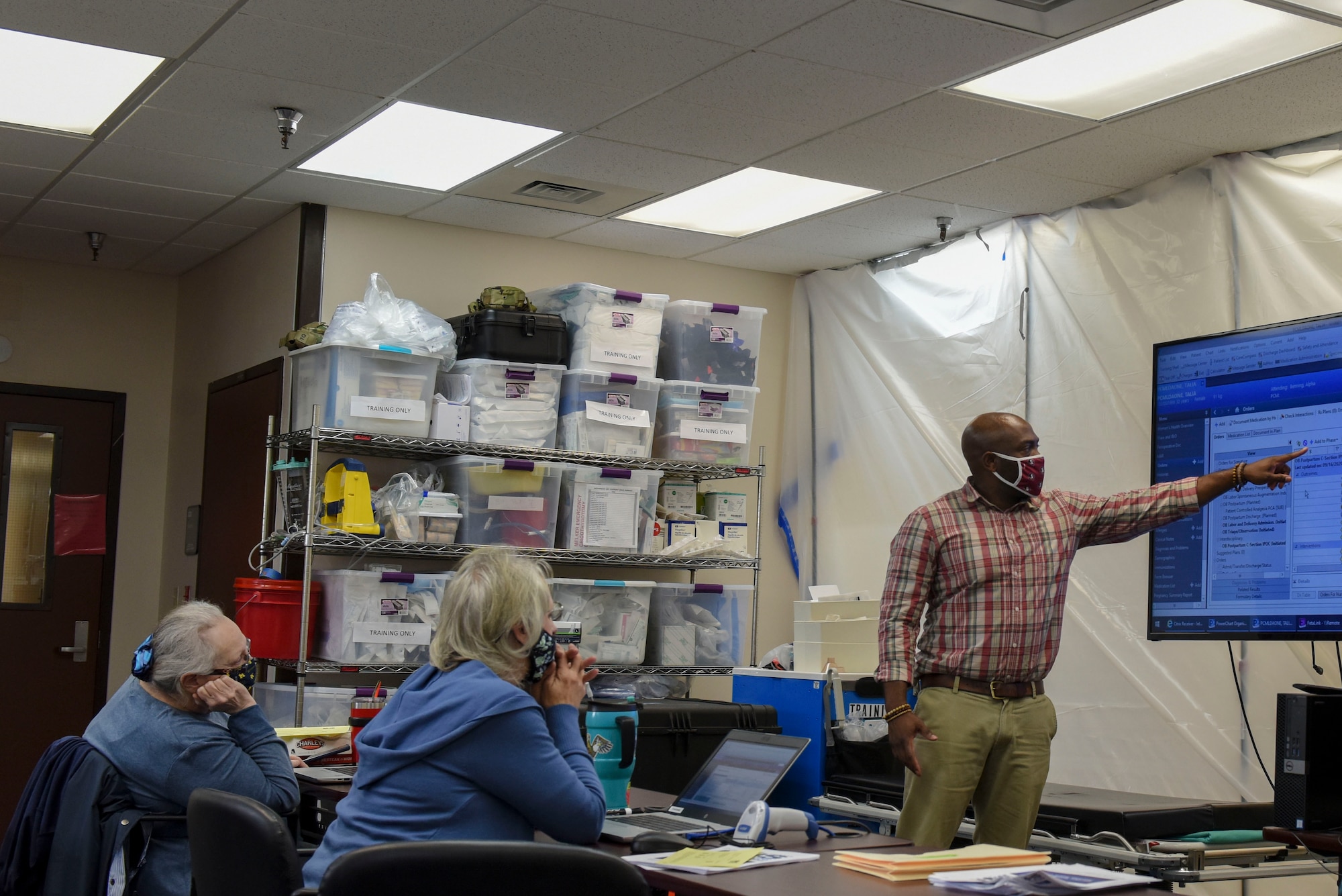 Personnel from the 354th Medical Group train on the Military Health System GENESIS at Eielson Air Force Base, Alaska, Sept. 16, 2020.