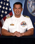 Official portrait of Capt. Vincent S. Tionquiao, the commanding officer of Naval Computer and Telecommunication Area Master Station (NCTAMS) Pacific.