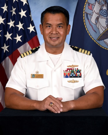 Official portrait of Capt. Vincent S. Tionquiao, the commanding officer of Naval Computer and Telecommunication Area Master Station (NCTAMS) Pacific.