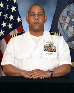 Official portrait of Cmdr. Victor T. Taylor, the chief staff officer and executive officer Naval Computer and Telecommunication Area Master Station (NCTAMS) Pacific.