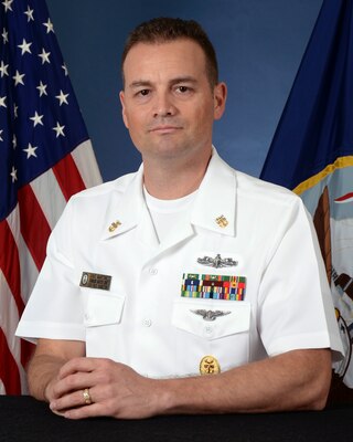 Official portrait of Master Chief David P. Martinez, command master Chief, Naval Computer and Telecommunications Area Master Station (NCTAMS) Pacific.