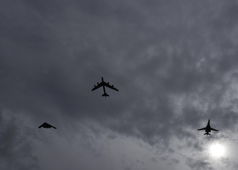 A U.S. Air Force B-52 Stratofortress, B-1 Lancer and B-2 Spirit fly over Guam after launching from Andersen Air Force Base, Guam, for an integrated bomber operation, Aug.17, 2016. This mission marks the first time in history that all three of Air Force Global Strike Command's strategic bomber aircraft are simultaneously conducting integrated operations in the U.S. Pacific Command area of operations. As of Aug. 15, the B-1 Lancer will be temporarily deployed to Guam in support of U.S. Pacific Command’s Continuous Bomber Presence mission. (U.S. Air Force photo by Tech. Sgt. Richard P. Ebensberger)