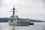 The Guided-missile destroyer USS Kidd (DDG 100) pulls into its homeport of Naval Station Everett.