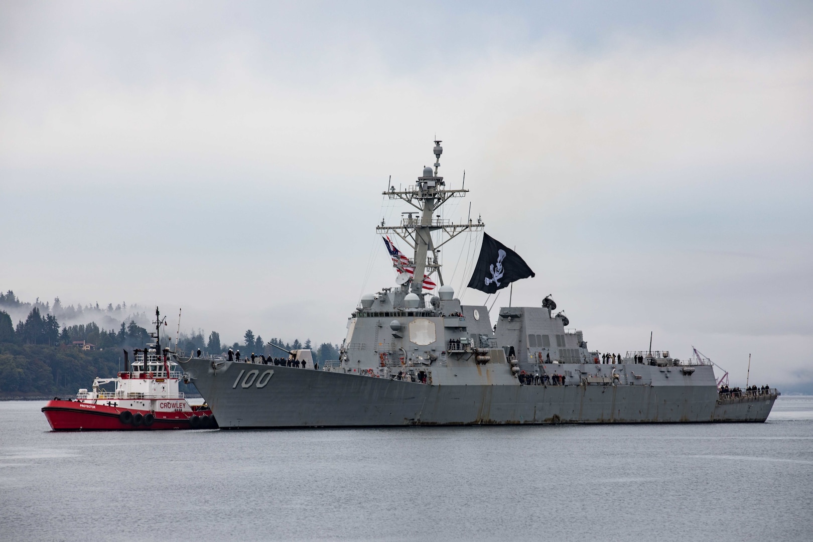 The Guided-missile destroyer USS Kidd (DDG 100) pulls into its homeport of Naval Station Everett.