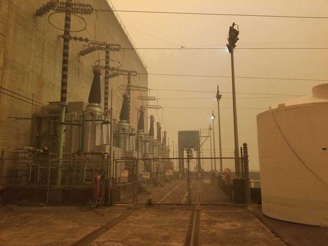 Photos of buildings, surrounded by wildfire smoke.