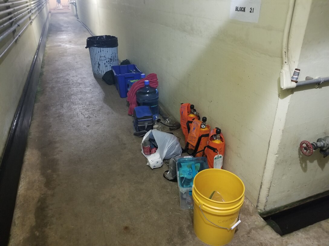 A photo of a bucket, breathing apparatus and other items that Mike Pomeroy staged inside the dam.