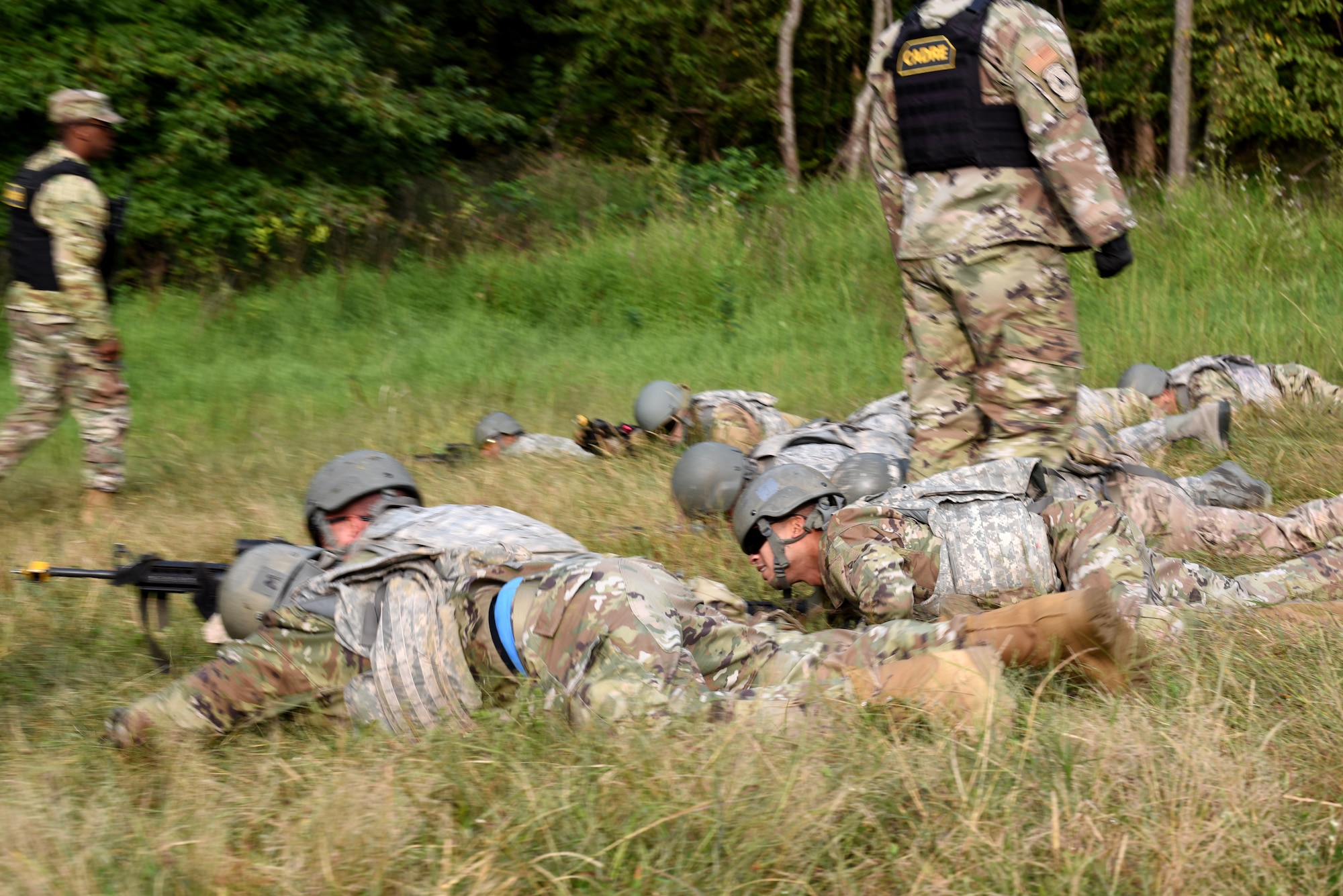 Photo of Airmen performing tactical movement drills during Fieldcraft Contingency Response training.
