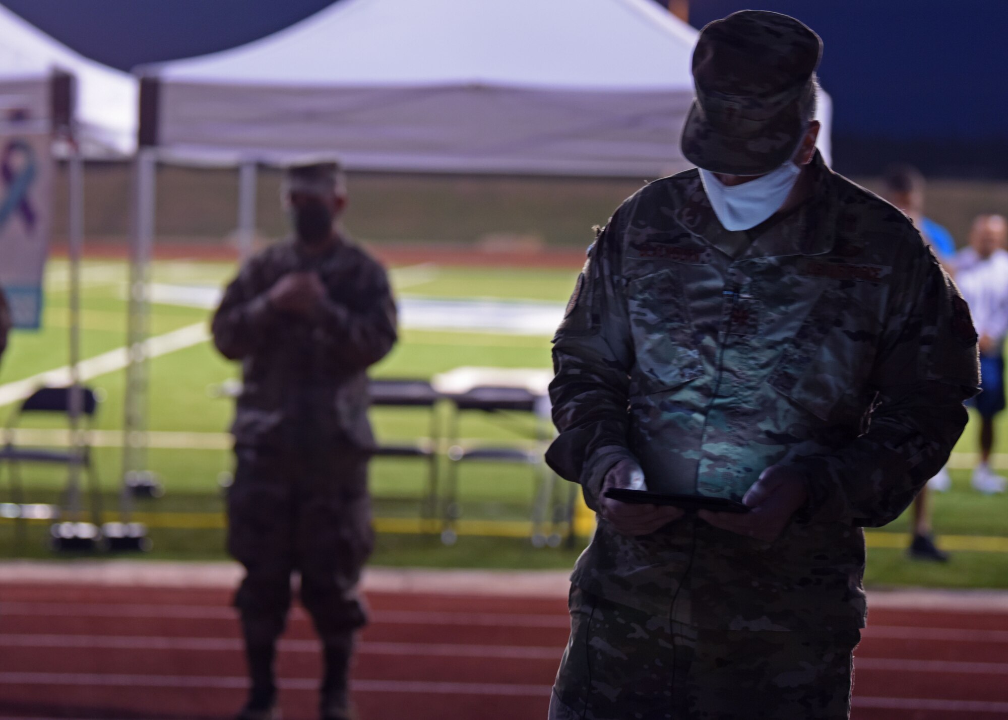U.S. Air Force Maj. Jeremiah Blackburn, 17th Training Wing chaplain, addresses participants at the Suicide Awareness 24 Hour Walk/Run at the Mathis Field Track on Goodfellow Air Force Base, Texas, Sept. 18, 2020. Blackburn spoke on the importance of fellowship in the military. (U.S. Air Force photo by Airman 1st Class Ethan Sherwood)