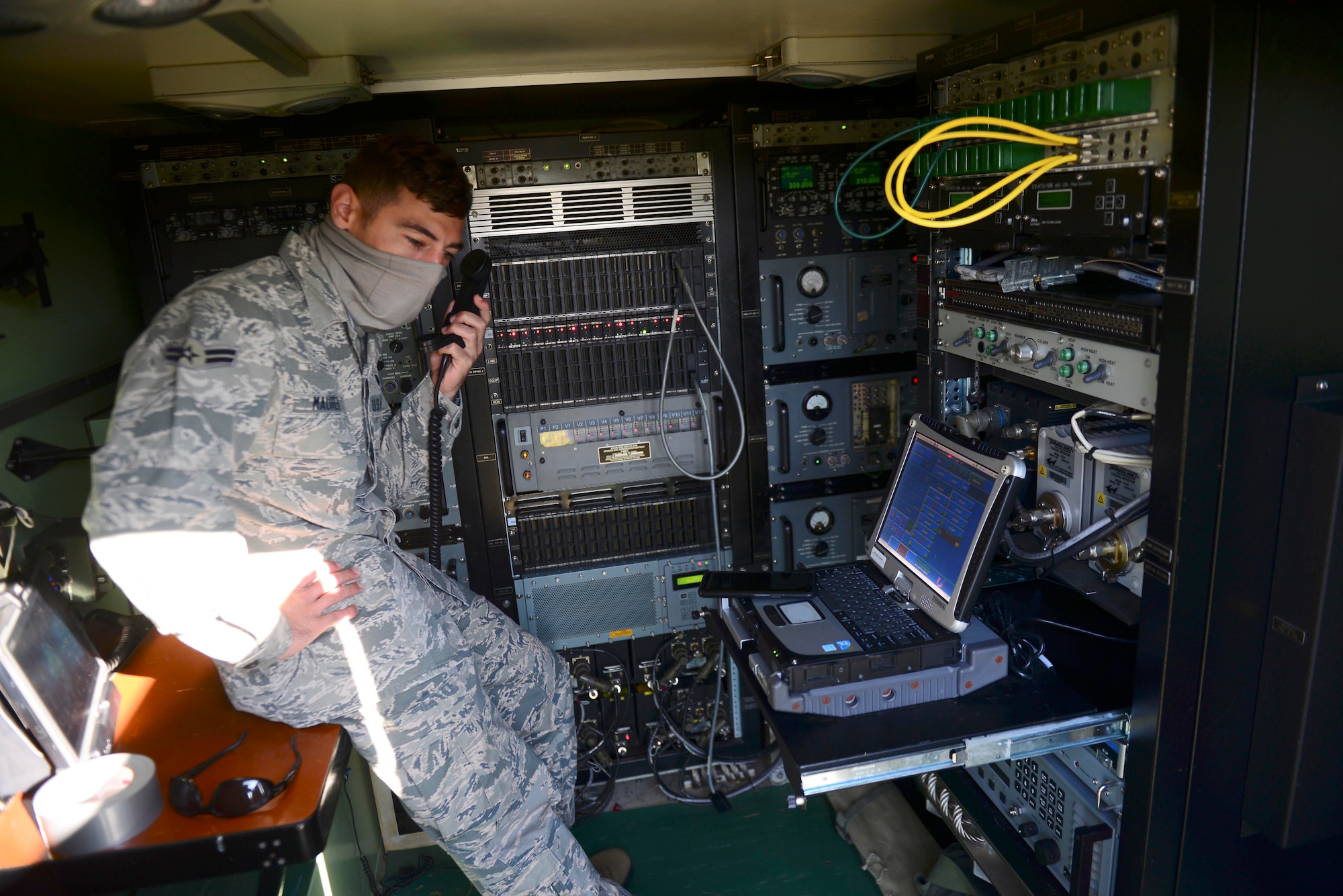 Airman 1st Class Jonathan Maurer, 606th Air Control Squadron radio frequency transmissions technician, conducts radio checks before a mission during exercise Astral Knight 20 at Malbork Air Base, Poland, Sept. 21, 2020. Astral Knight 20 is the premier U.S. Air Forces in Europe and Air Forces Africa-sponsored Integrated Air and Missile Defense exercise. (U.S. Air Force photo by Tech. Sgt. Tory Cusimano)