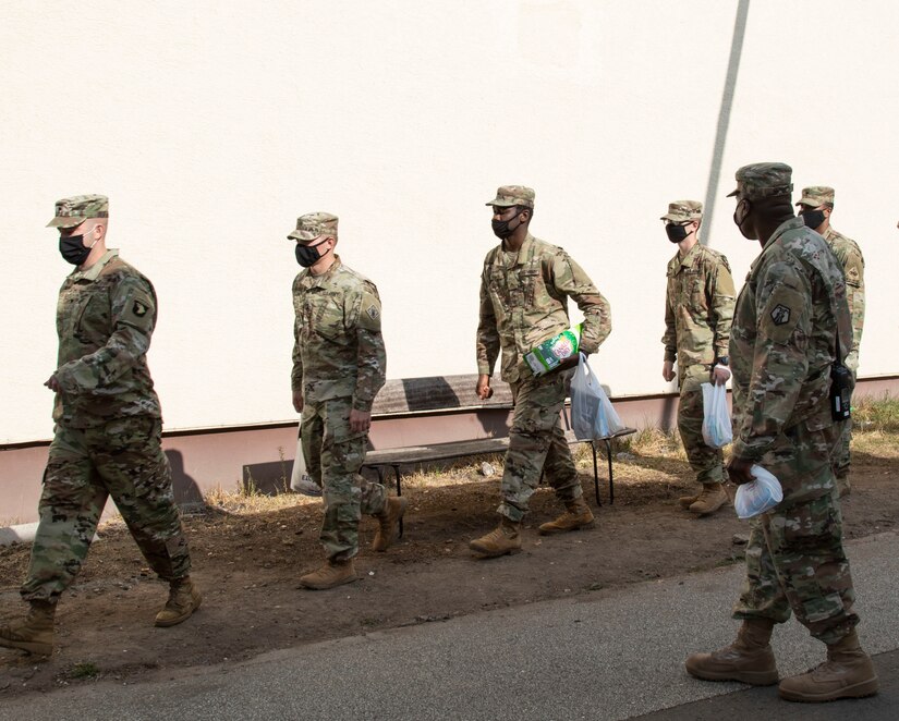 Inbound Soldiers from the United States to Europe, get comfort items from the shoppette then march back to the Deployment Processing Center, Rhine Ordnance Barracks in Kaiserslautern, Germany September 11, 2020. The DPC currently houses incoming personnel from the United States undergoing quarantine and in-processing to the European theater. Task Force Willkommen is a group of organizations facilitating this process during the COVID-19 pandemic. (U.S. Army Reserve photo by Staff Sgt. Chris Jackson/Released)