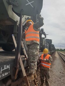 U.S. Army Reserve Sgt. Fabio Gaviria of the 793rd Movement Control Team, 446th Movement Control Battalion, 510th Regional Support Group, 7th Mission Support Command, performs security checks on equipment shipped by rail from Bergen-Hohne to Coleman Barracks, Germany, Sept. 13, 2020.  MCT Soldiers under the 446th tracked more than 2,600 pieces of redeployed equipment to close out their support to DEFENDER-Europe 20 Plus. (U.S. Army Reserve photo by Staff Sgt. Christopher Pelican)