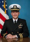 Official portrait Lt. Cmdr. Christopher Mullen, the officer in charge of Naval Computer and Telecommunications Area Master Station (NCTAMS) Pacific Detachment Puget Sound.