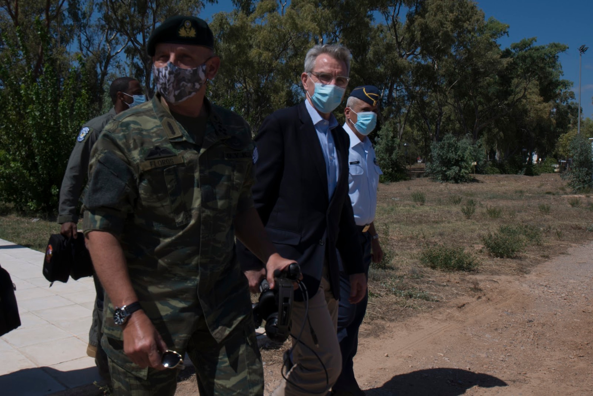 General Konstantinos Floros, chief of the Hellenic National Defence General Staff, left, and Geoffrey R. Pyatt, U.S. ambassador to the Hellenic Republic, center, walk towards a C-130J Super Hercules aircraft assigned to the 86th Airlift Wing at Elefsis Air Base, Greece, Sept. 11, 2020. Pyatt began his tenure as U.S. ambassador in 2016. (U.S. Air Force photo by Airman 1st Class Taylor D. Slater)