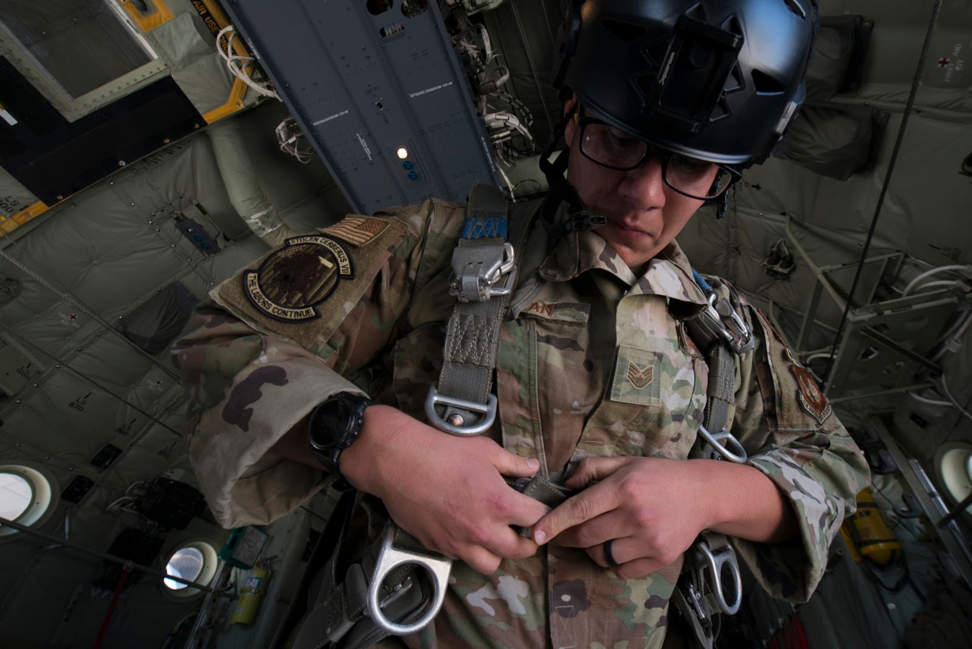 U.S. Air Force Staff Sgt. Seth Allan, 435th Contingency Response Squadron independent duty medical technician, secures his parachute before takeoff at Elefsis Air Base, Greece, Sept. 11, 2020. IDMTs are trained to treat any active duty member for illness or injury in the absence of a medical provider. (U.S. Air Force photo by Airman 1st Class Taylor D. Slater)