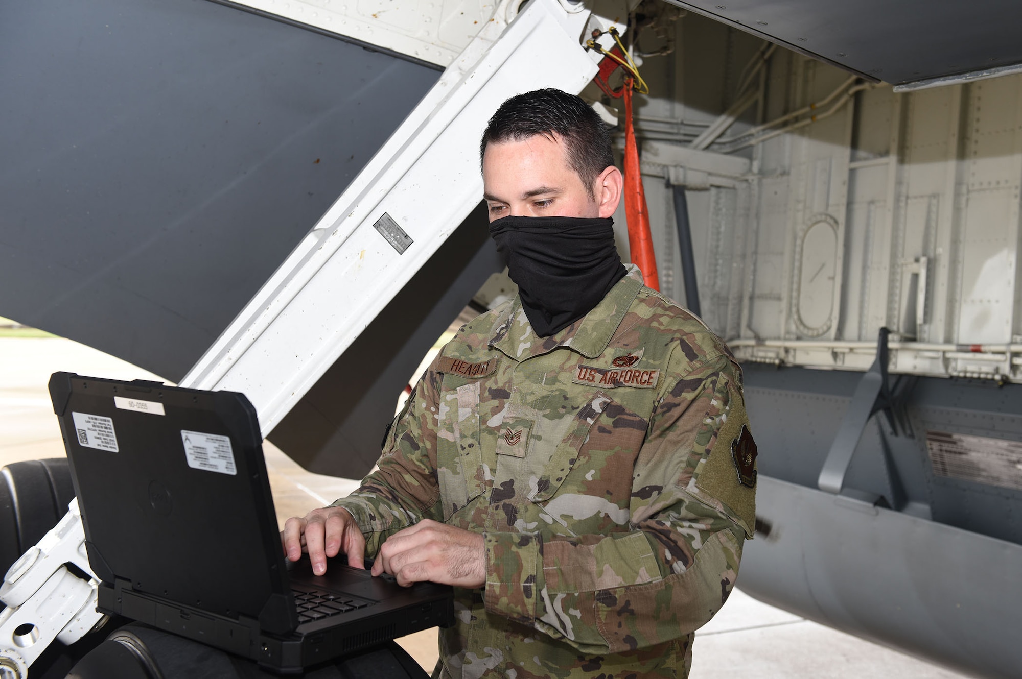 Tech Sgt. Michael Heasley, 100th Aircraft Maintenance Squadron flying crew chief manager, updates the 100th Maintenance Group’s virtual forms program after conducting checks on a KC-135 Stratotanker aircraft at Royal Air Force Mildenhall, England, Sept. 3, 2020. The 100th MXG recently became the first legacy unit in the Air Force to transition full virtual forms for its aircraft, removing the need for paper binders and saving dollars and resources. (U.S. Air Force photo by Karen Abeyasekere)