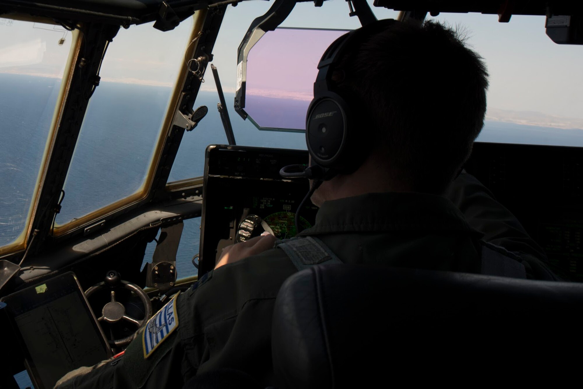 U.S. Air Force Capt. Joseph Rippe, gazes at Megara Bay, Greece, during Operation Stolen Cerberus VII, Sept. 11, 2020. Operation Stolen Cerberus is an exercise designed to enhance interoperability and airlift capabilities among allied forces through realistic, joint air operation scenarios. (U.S. Air Force photo by Airman 1st Class Taylor D. Slater)