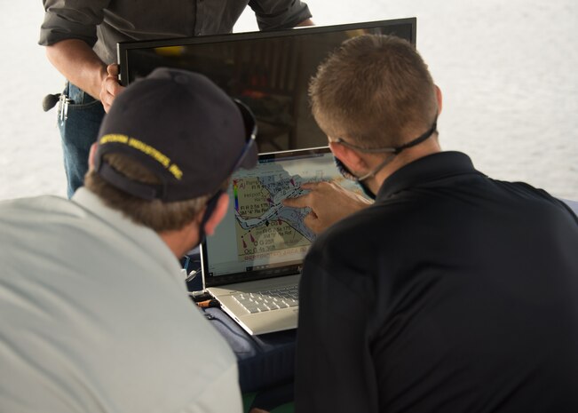 Naval Surface Warfare Center Panama City Division (NSWC PCD) recently collaborated with Commander, Naval Meteorology and Oceanography Command in coordination with the Naval Oceanographic Office’s Fleet Survey Team, and Klein Marine to conduct a live Advanced Naval Technology Exercise (ANTX) event at NSWC PCD. Team members review the survey plan prior to beginning the ANTX event.