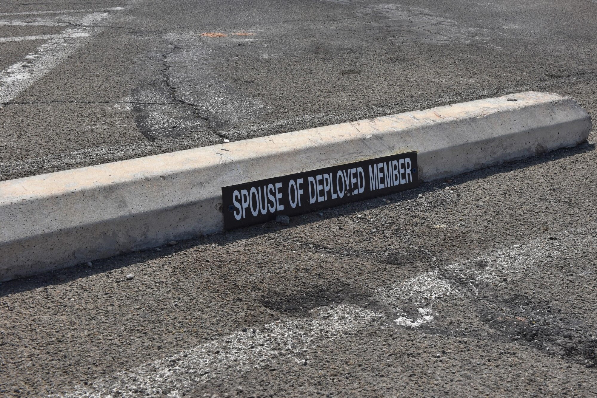 An updated Spouse of Deployed Members’ parking area marks the special parking available to family of deployed service members near the base commissary on Goodfellow Air Force Base, Texas, Sept. 16, 2020. Along with new Maternity parking spaces, the Spouse of Deployed Member parking spots were added to help all members and families across base. (U.S. Air Force photo by Staff Sgt. Seraiah Wolf)