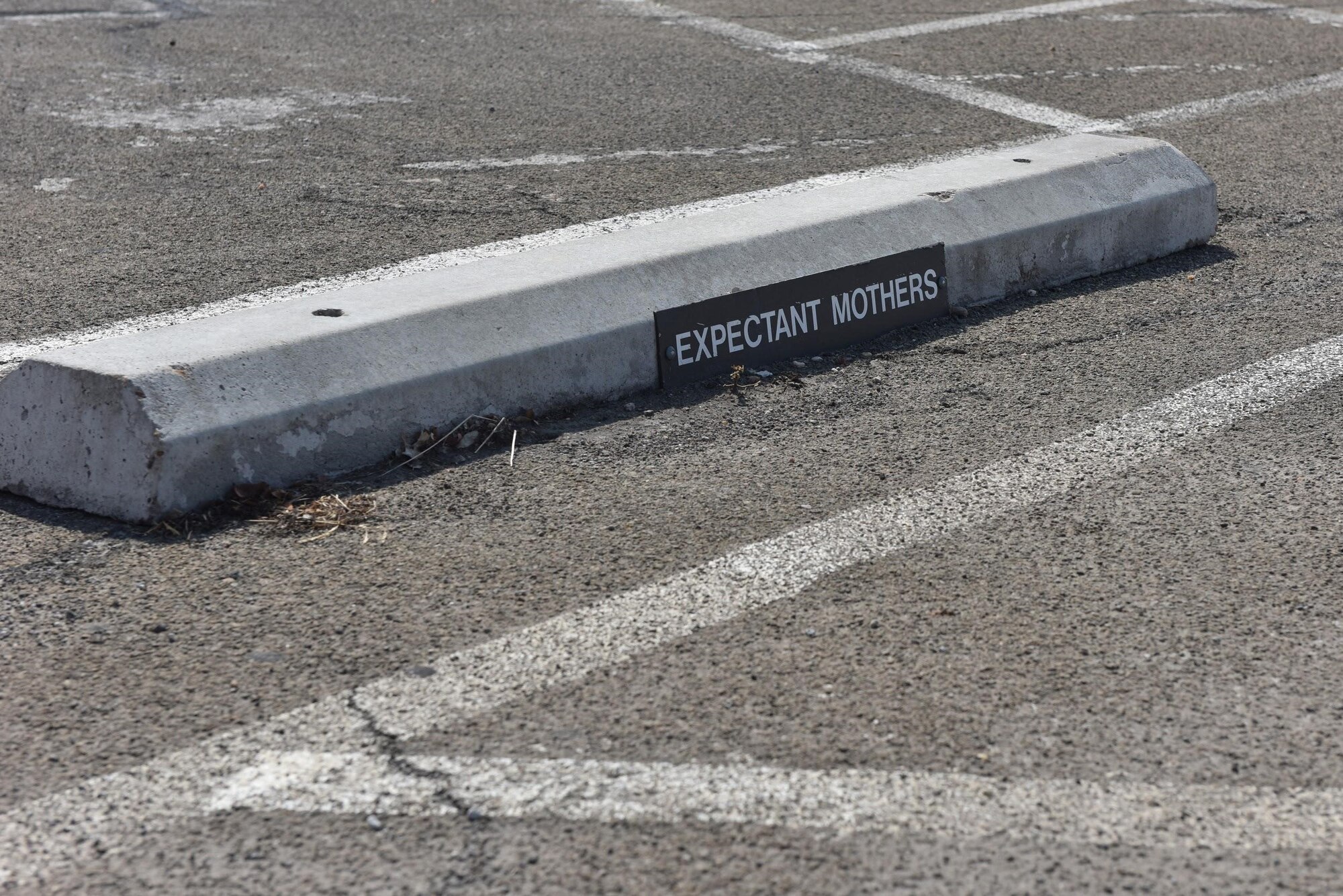 A newly updated Expectant Mothers parking spot is available outside the base commissary on Goodfellow Air Force Base, Texas, Sept. 16, 2020. Expectant Mothers parking and Spouse of Deployed Member parking are not required by law; they were created to provide more diversity and inclusion resources to base and family members. (U.S. Air Force photo by Staff Sgt. Seraiah Wolf)