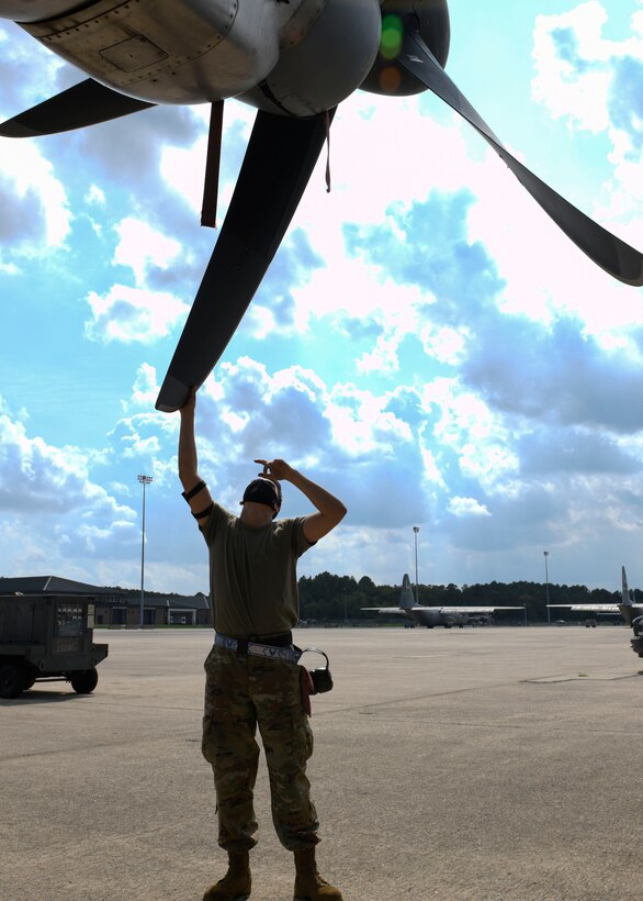 U.S. Air Force Reserve Airman 1st Class Micco Moore, 913th Aircraft Maintenance Squadron crew chief, inspects the propeller of a C-130J Super Hercules at Little Rock Air Force Base, Ark., Sept. 10, 2020. Moore used his passion and determination to fuel himself through training and stand out amongst his fellow Airmen along the way. (U.S. Air Force Reserve photo by Airman 1st Class Julia Ford)