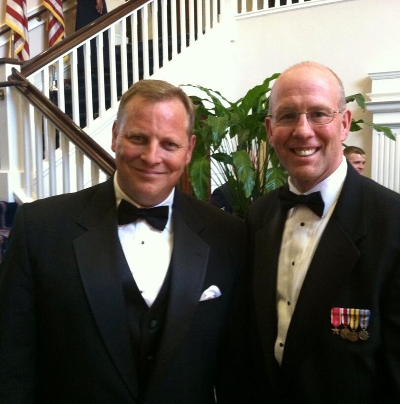Special Agent Jack Angelo poses with former Office of Special Investigations crime fighting partner, now OSI Headquarters Organizational Development Director, Mr. Ken Sallinger, at an Order of the Sword ceremony in 2013. (Courtesy photo)