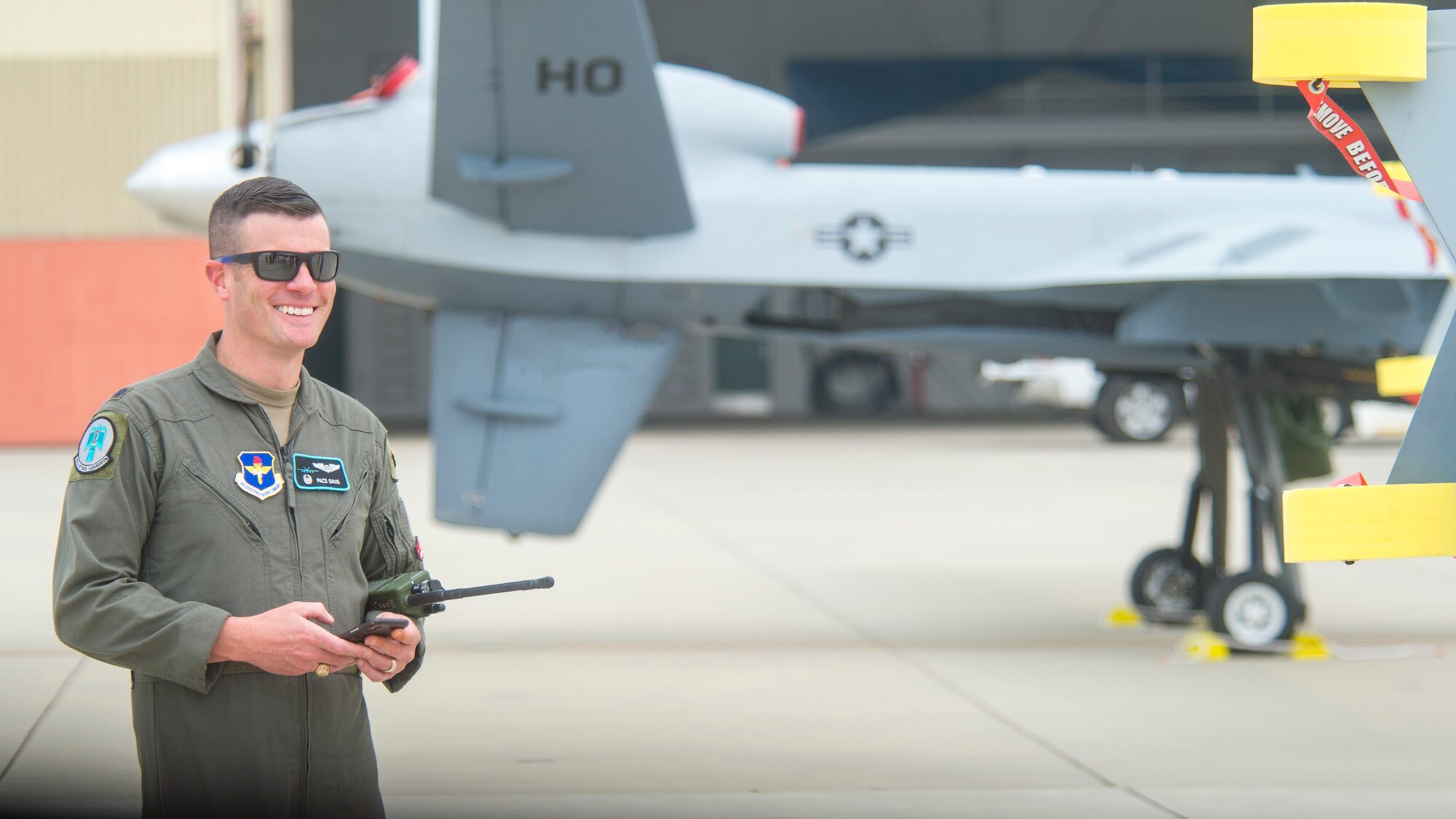 Col. Brian Davis, 29th Attack Squadron commander, smiles prior to a MQ-9 Reaper launch during Exercise Agile Reaper, Sept. 15, 2020, at Naval Air Station Point Mugu, California. This training exercise focuses on the improvement of total force relationships, training the next generation of combat airpower, building operational capabilities and demonstrating the agile, penetrating and persistent multi-role maritime combat capabilities of the MQ-9 Reaper. (U.S. Air Force photo by Senior Airman Collette Brooks)