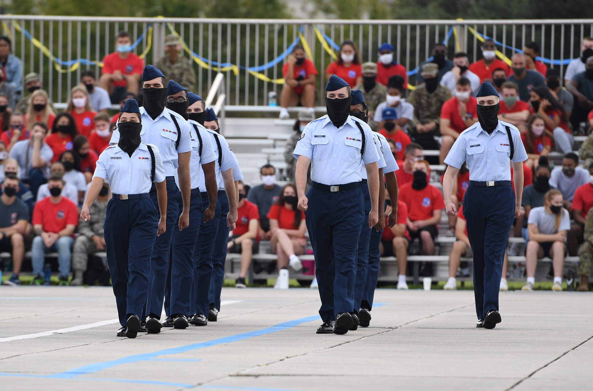 Members of the 338th Training Squadron regulation drill team perform during the 81st Training Group drill down on the Levitow Training Support Facility drill pad at Keesler Air Force Base, Mississippi, Sept. 18, 2020. Airmen from the 81st TRG competed in a quarterly open ranks inspection, regulation drill routine and freestyle drill routine. Keesler trains more than 30,000 students each year. While in training, Airmen are given the opportunity to volunteer to learn and execute drill down routines. (U.S. Air Force photo by Kemberly Groue)