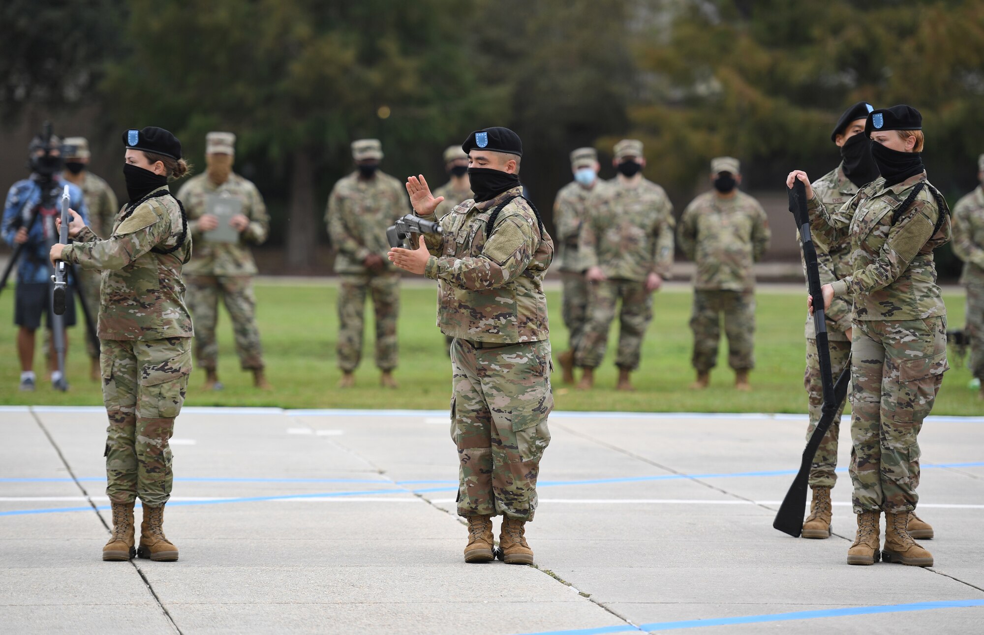 Members of the 338th Training Squadron freestyle drill team perform during the 81st Training Group drill down on the Levitow Training Support Facility drill pad at Keesler Air Force Base, Mississippi, Sept. 18, 2020. Airmen from the 81st TRG competed in a quarterly open ranks inspection, regulation drill routine and freestyle drill routine. Keesler trains more than 30,000 students each year. While in training, Airmen are given the opportunity to volunteer to learn and execute drill down routines. (U.S. Air Force photo by Kemberly Groue)