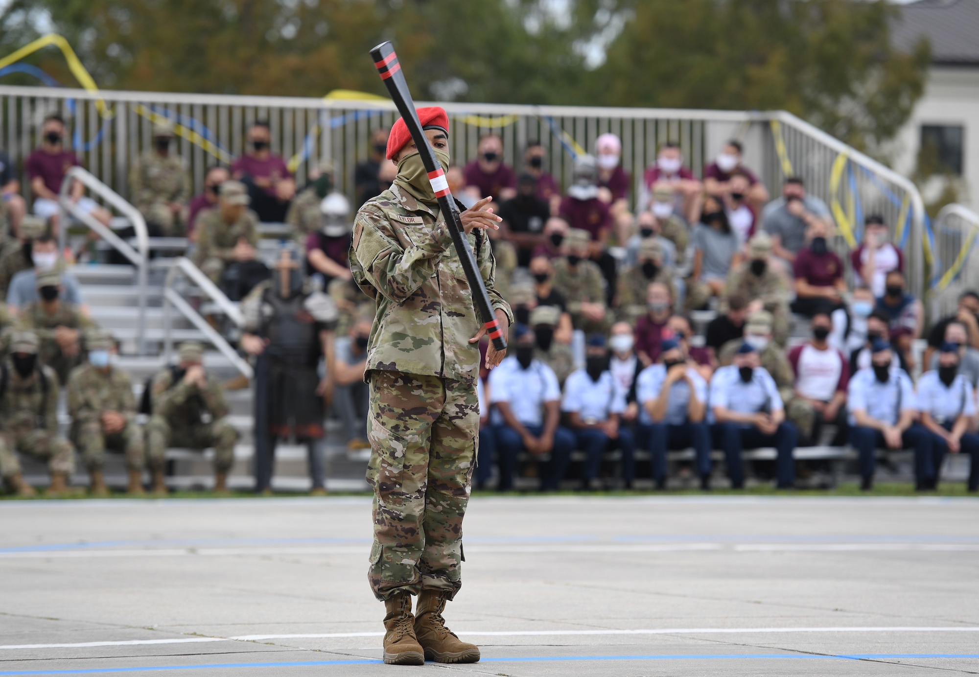 U.S. Air Force Airman 1st Class Tyrone Taylor, 335th Training Squadron freestyle drill team member, performs during the 81st Training Group drill down on the Levitow Training Support Facility drill pad at Keesler Air Force Base, Mississippi, Sept. 18, 2020. Airmen from the 81st TRG competed in a quarterly open ranks inspection, regulation drill routine and freestyle drill routine. Keesler trains more than 30,000 students each year. While in training, Airmen are given the opportunity to volunteer to learn and execute drill down routines. (U.S. Air Force photo by Kemberly Groue)