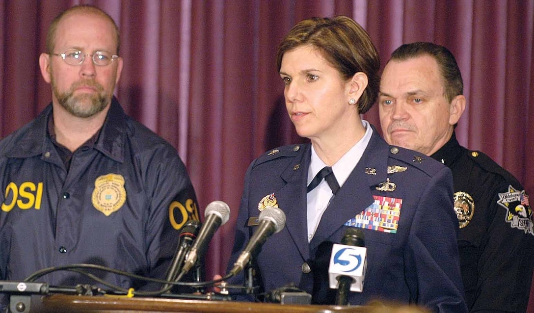 Office of Special Investigations Special Agent Jack Angelo with then Brig. Gen. Lori Robinson, 52nd Airborne Warning and Control Wing Commander, at a double homicide/suicide press conference at Tinker Air Force Base, Okla., in 2008. (Courtesy photo)