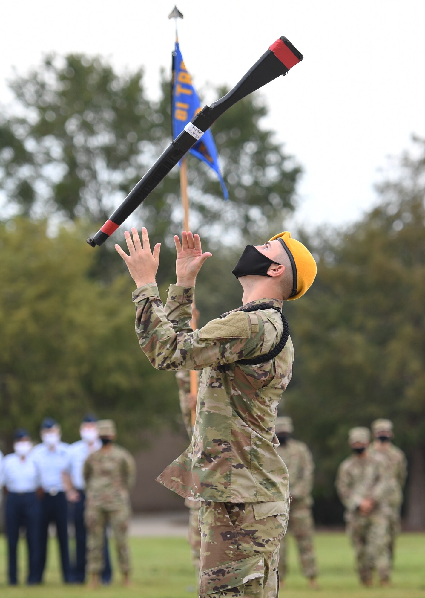 U.S. Air Force Airman 1st Class Jack Schwarzen, 335th Training Squadron freestyle drill team member, performs during the 81st Training Group drill down on the Levitow Training Support Facility drill pad at Keesler Air Force Base, Mississippi, Sept. 18, 2020. Airmen from the 81st TRG competed in a quarterly open ranks inspection, regulation drill routine and freestyle drill routine. Keesler trains more than 30,000 students each year. While in training, Airmen are given the opportunity to volunteer to learn and execute drill down routines. (U.S. Air Force photo by Kemberly Groue)