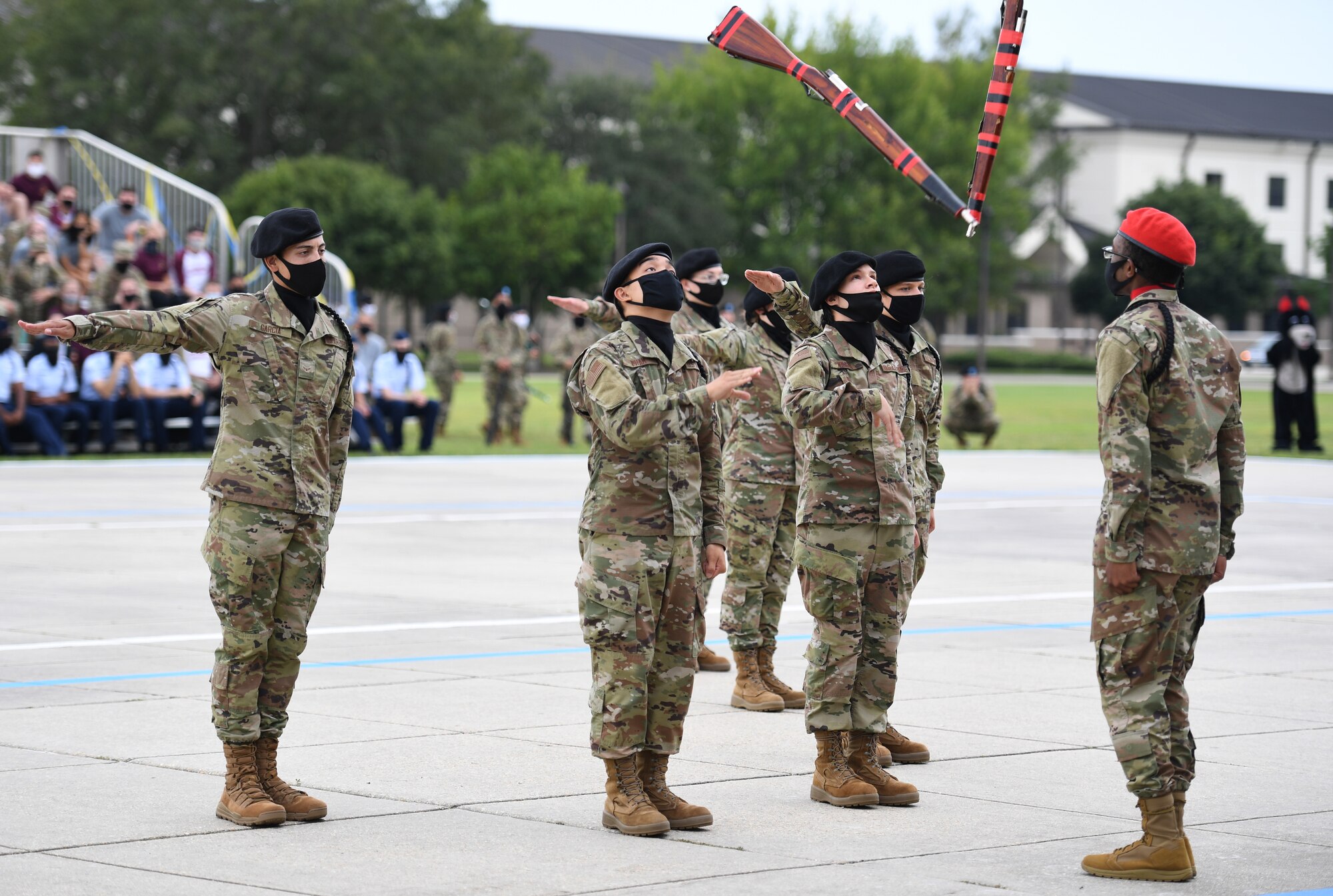 Members of the 336th Training Squadron freestyle drill team perform during the 81st Training Group drill down on the Levitow Training Support Facility drill pad at Keesler Air Force Base, Mississippi, Sept. 18, 2020. Airmen from the 81st TRG competed in a quarterly open ranks inspection, regulation drill routine and freestyle drill routine. Keesler trains more than 30,000 students each year. While in training, Airmen are given the opportunity to volunteer to learn and execute drill down routines. (U.S. Air Force photo by Kemberly Groue)