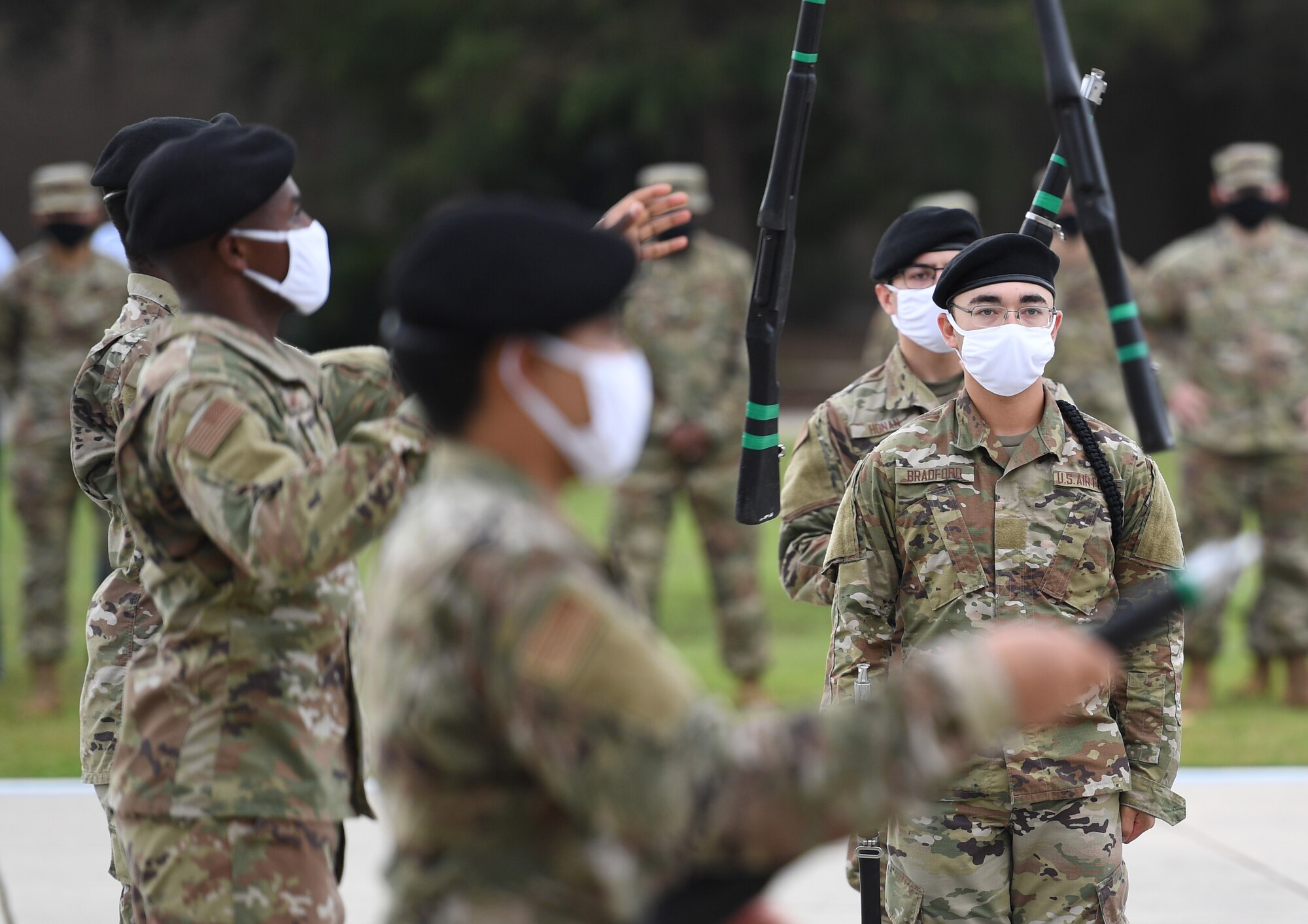 Members of the 334th Training Squadron freestyle drill team perform during the 81st Training Group drill down on the Levitow Training Support Facility drill pad at Keesler Air Force Base, Mississippi, Sept. 18, 2020. Airmen from the 81st TRG competed in a quarterly open ranks inspection, regulation drill routine and freestyle drill routine. Keesler trains more than 30,000 students each year. While in training, Airmen are given the opportunity to volunteer to learn and execute drill down routines. (U.S. Air Force photo by Kemberly Groue)