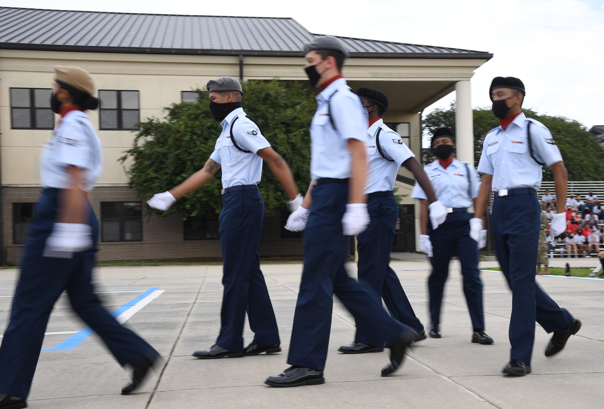 Members of the 335th Training Squadron regulation drill team perform during the 81st Training Group drill down on the Levitow Training Support Facility drill pad at Keesler Air Force Base, Mississippi, Sept. 18, 2020. Airmen from the 81st TRG competed in a quarterly open ranks inspection, regulation drill routine and freestyle drill routine. Keesler trains more than 30,000 students each year. While in training, Airmen are given the opportunity to volunteer to learn and execute drill down routines. (U.S. Air Force photo by Kemberly Groue)