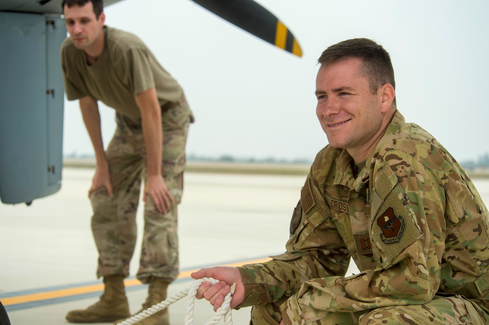 (Right) Capt. Dylan Cross, 29th Attack Squadron flight commander and MQ-9 Reaper instructor pilot, assists in a MQ-9 launch, Sept. 12, 2020, during Exercise Agile Reaper at Naval Air Station Point Mugu, California. This routine training exercise focuses on superior training of next-generation warfighters while demonstrating the MQ-9’s ability to support forces during combat maritime training by rapidly moving persistent, multi-role aircraft across the battlespace when least expected. (U.S. Air Force photo by Senior Airman Collette Brooks)