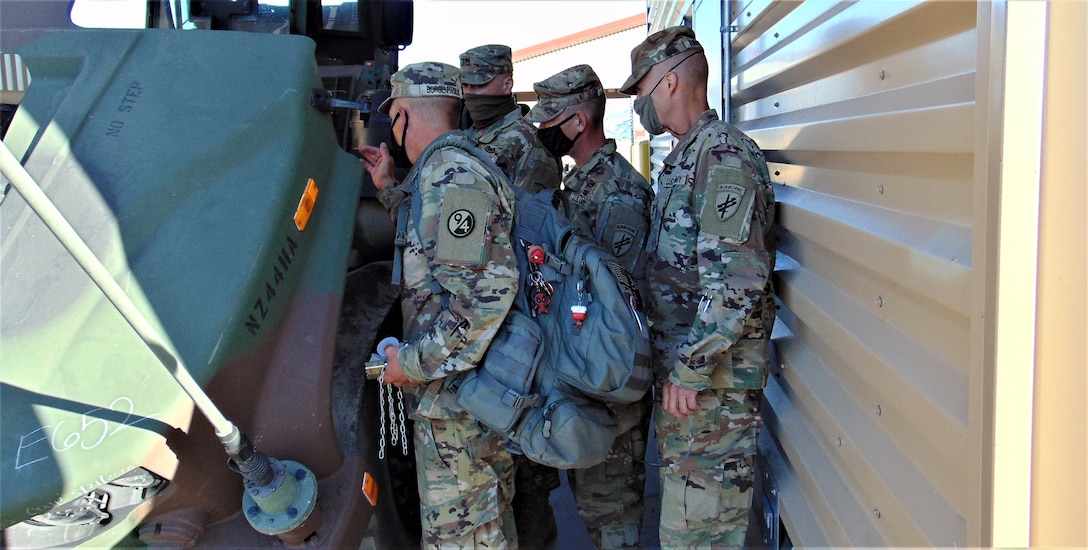 Instructors assigned to the 3rd Brigade, 94th Training Division – Force Sustainment explain the Joint Light Tactical Vehicle characteristics, features, operations, and maintenance aspects to students attending the first Fort Hunter Liggett, California, JLTV Operator New Equipment Training Course Aug. 9-14, 2020. The 94th TD-FS leads the JLTV driver’s training courses for all Army components. (U.S. Army Reserve photo by Staff Sgt. Eric Sievert)