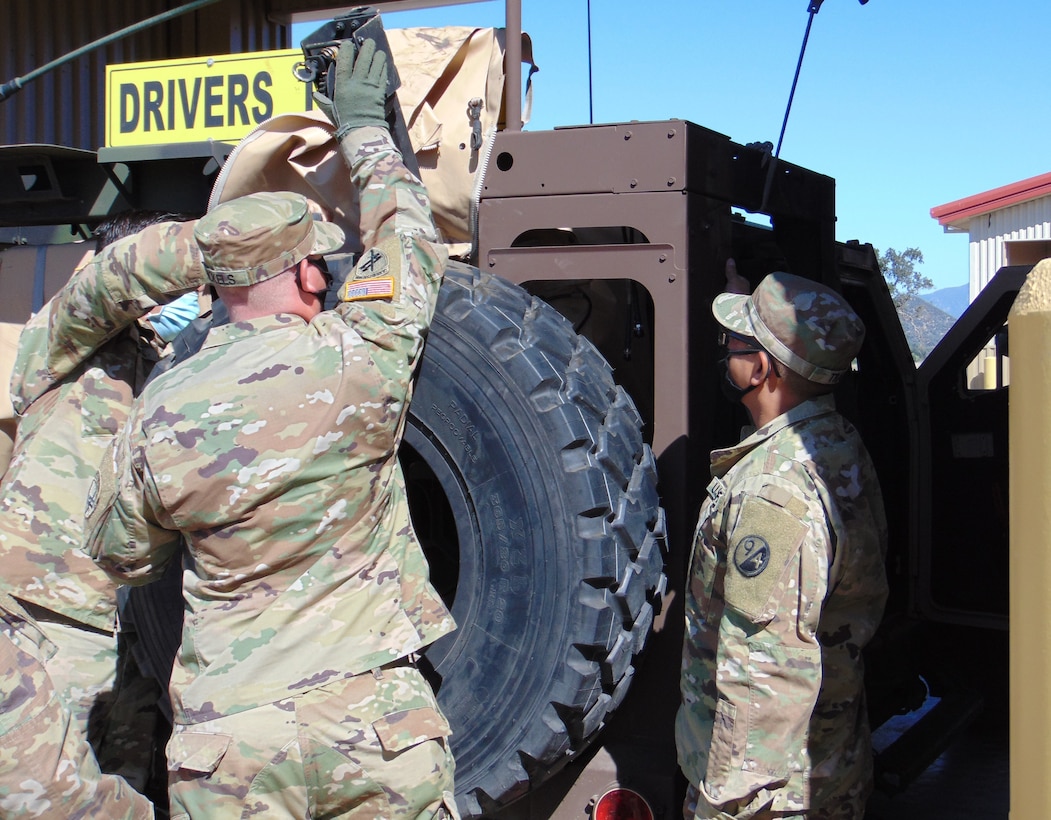 Instructors assigned to the 3rd Brigade, 94th Training Division – Force Sustainment explain the Joint Light Tactical Vehicle characteristics, features, operations, and maintenance aspects to students attending the first Fort Hunter Liggett, California, JLTV Operator New Equipment Training Course Aug. 9-14, 2020. The 94th TD-FS leads the JLTV driver’s training courses for all Army’s components. (U.S. Army Reserve photo by Staff Sgt. Eric Sievert)