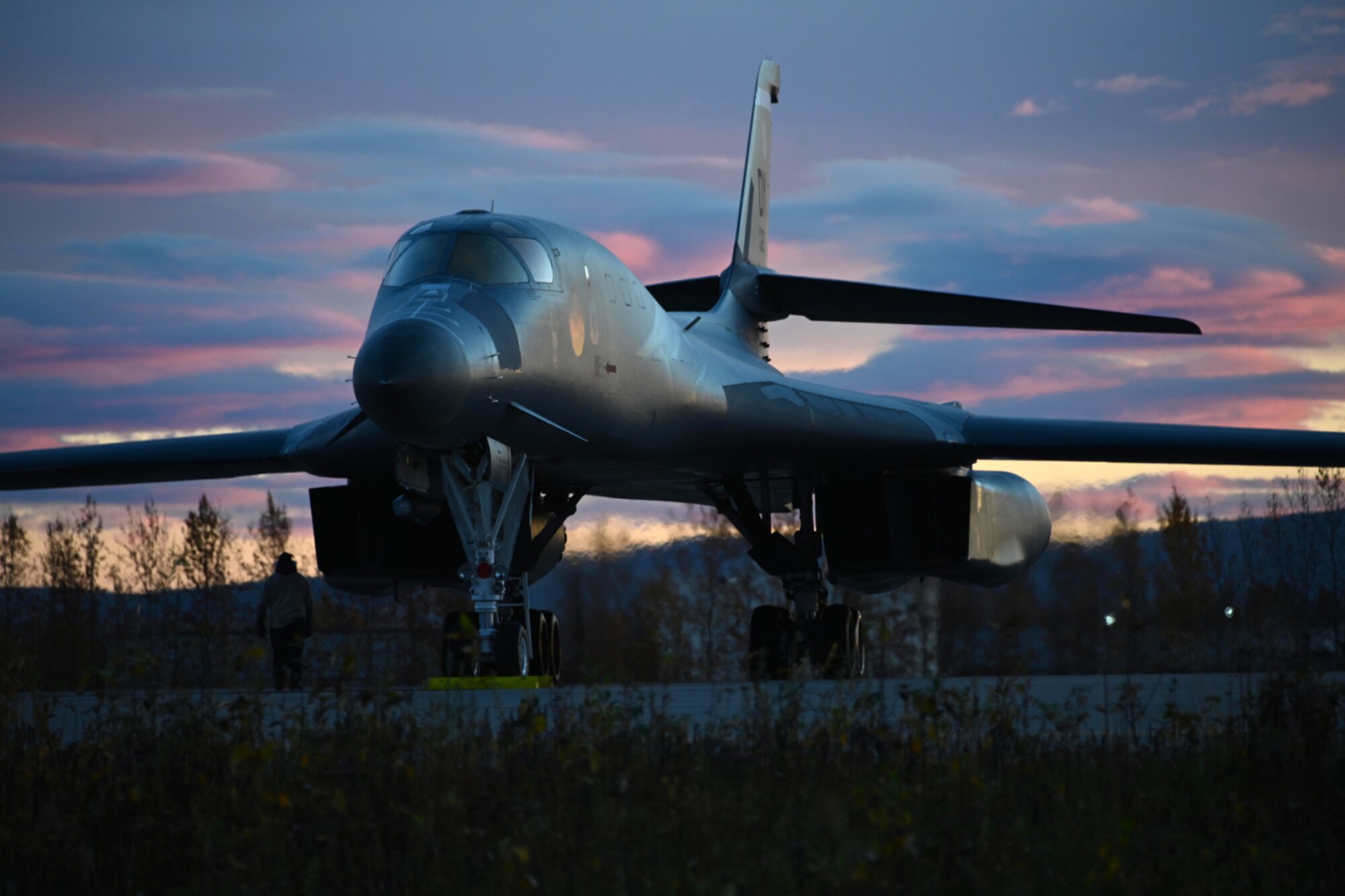 Photo of B-1 at sunrise sitting on ramp