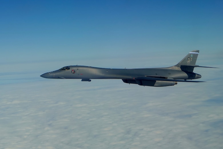 Photo of B-1 flying over clouds
