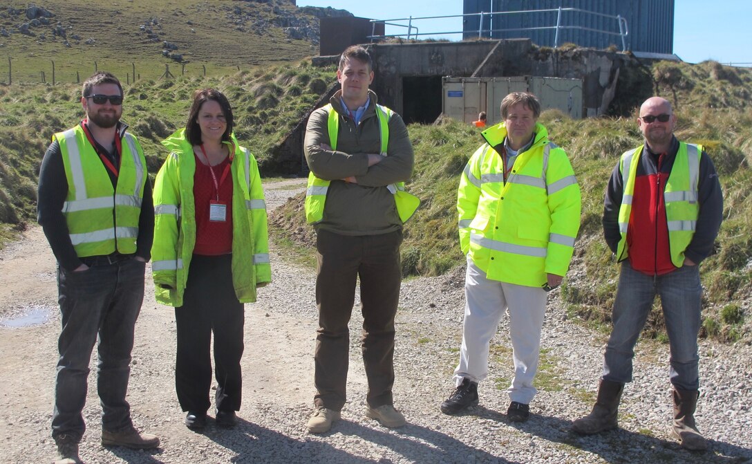 University of Sheffield’s Dr. Sam Rigby; U.S. Army Engineer Research and Development Center’s (ERDC) Dr. Catie Stephens; Maj. Andy Wilson, U.K. liaison officer to ERDC; ERDC’s James Davis; and University of Sheffield’s Andy Tyas pictured at the University of Sheffield’s blast testing facility in Buxton, U.K., where the Characterisation of Blast Loading testing equipment is located.